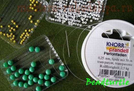 Мастер-класс по бисероплетению: Плетение зелёного шарика с ромашками